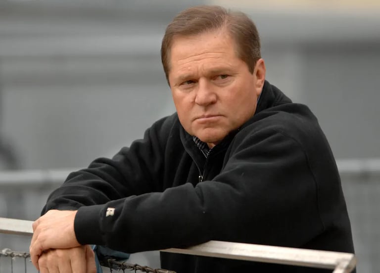 Scott Boras, MLB Super Agent, sitting at a conference.