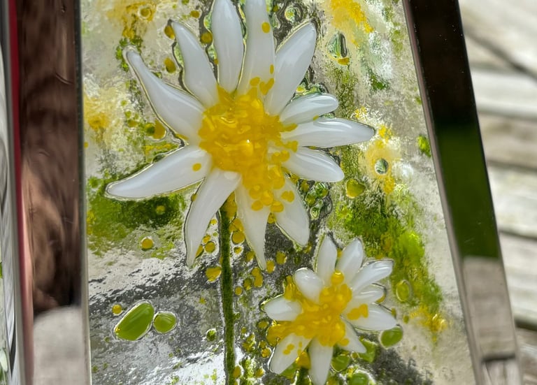 a picture made from fuse glass with flowers