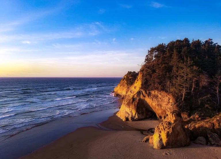 Oregon Coast - The beach, Hug Point State Rec Site with a warm glow before sunset