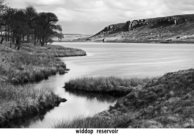 a black and white photo of widdop reservoir fine art water
