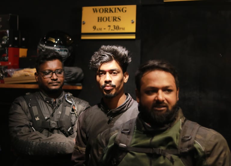a group of men standing in a room