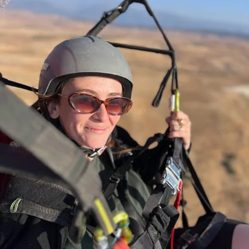 An American traveler paragliding in Atlas