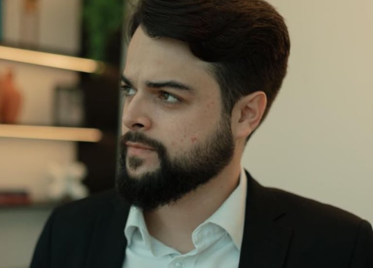 a man with a beard and a beard