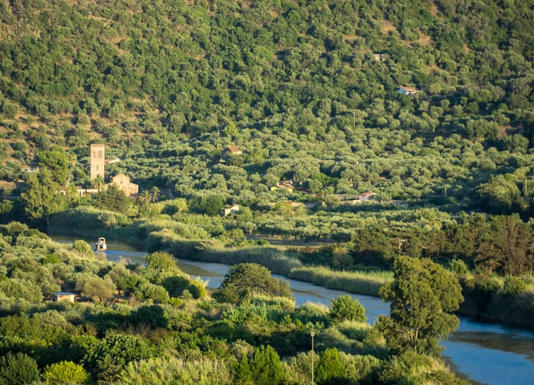 View of Temo River and San Pietro church in Bosa, Sardinia