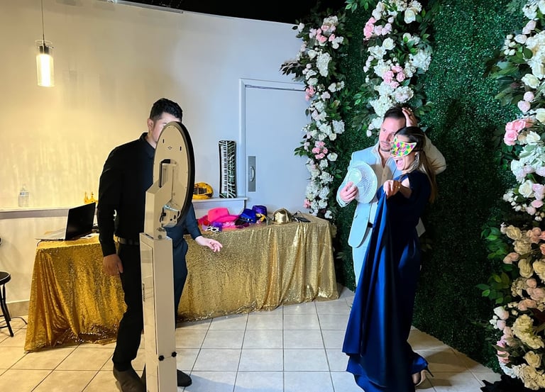 alt="Social Booth photobooth with guests in Maryland quinceañera event"