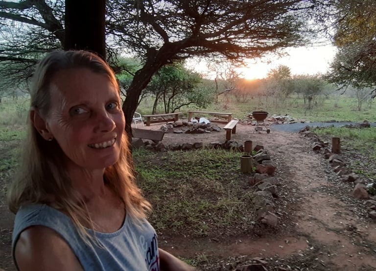 Fire pit area next to communal kitchen for the affordable glamping dome tent accommodation in Hluhluwe