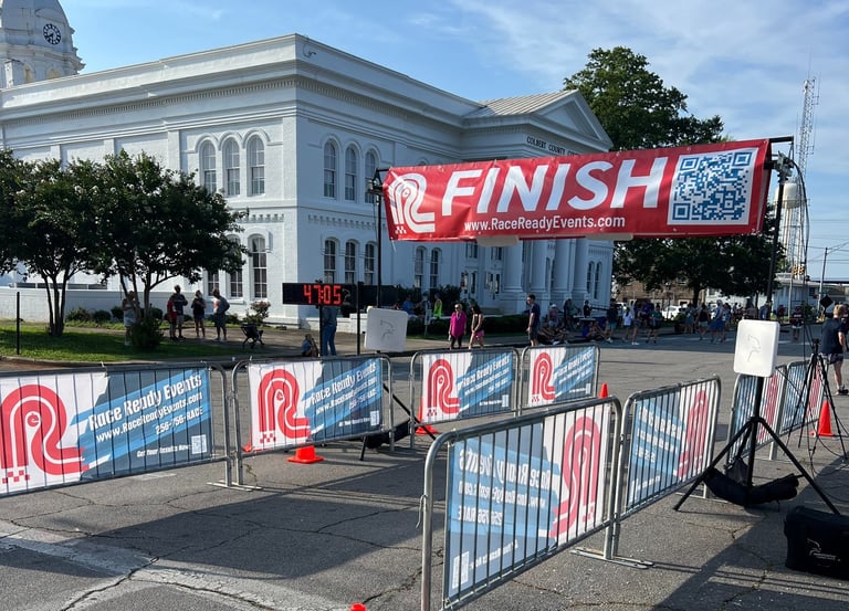 Race Ready Finish Line with the background of the beautiful white marble colbert county courthouse