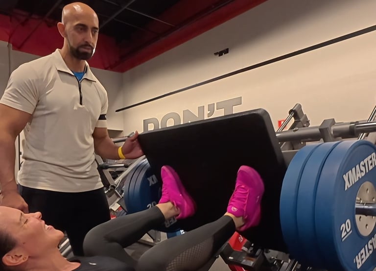 a man and woman doing a sit up on a bench