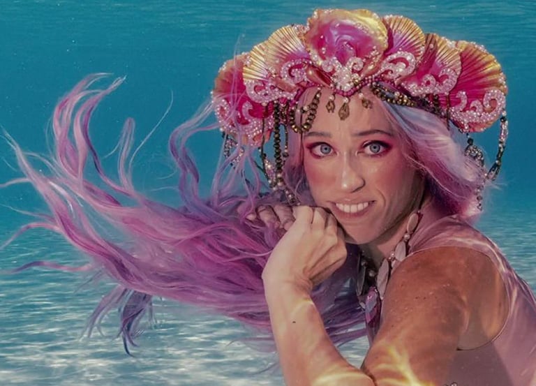 Mermaid Pixi models underwater during Netflix filming MerPeople, King and Queen of the Seas Pageant