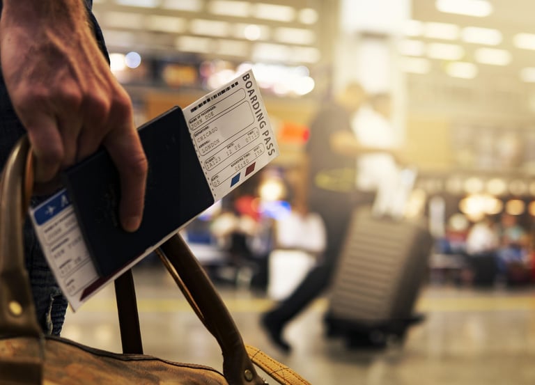 a person with boarding pass in an airport