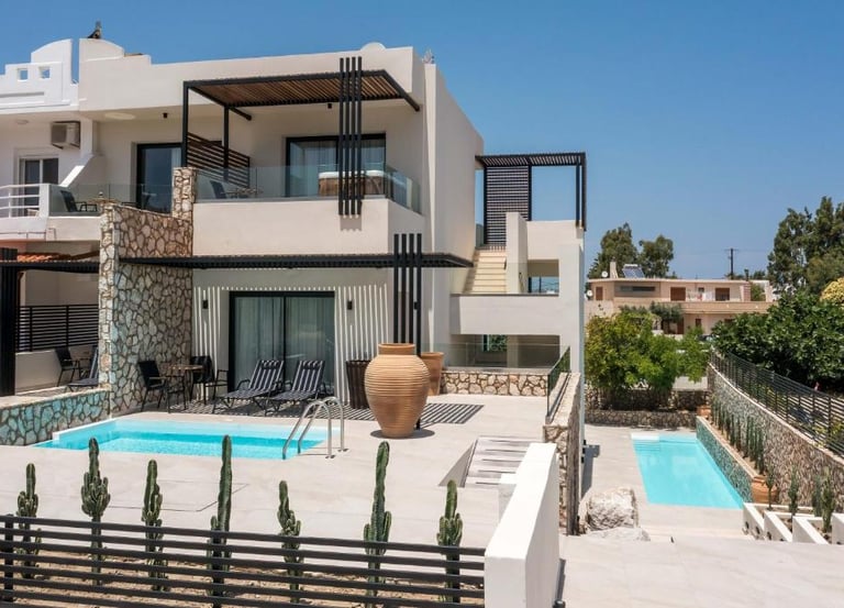 Modern luxury villa in Greece with private swimming pools and terrace.