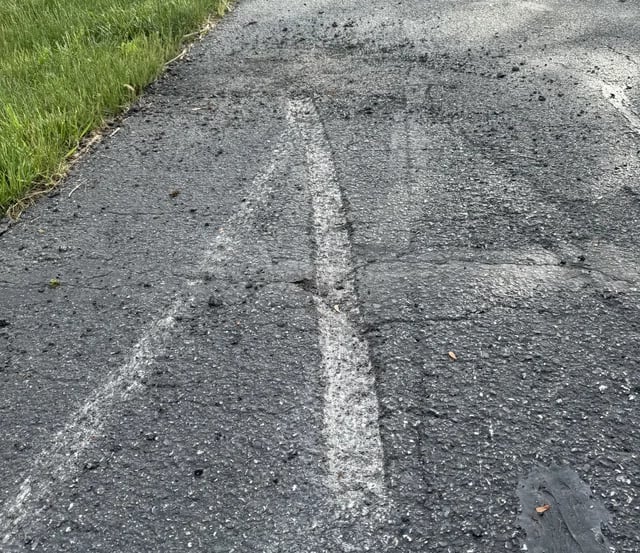Poor quality asphalt job example