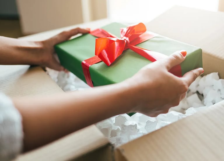Lady is unboxing a Gift Box