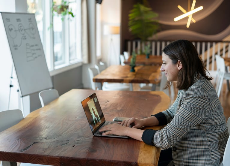 Lady is on video consultation