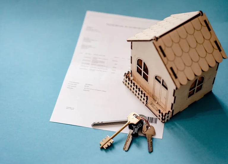 Loan contract with keys and small wooden house, symbol of mortgage approved for first-time buyers
