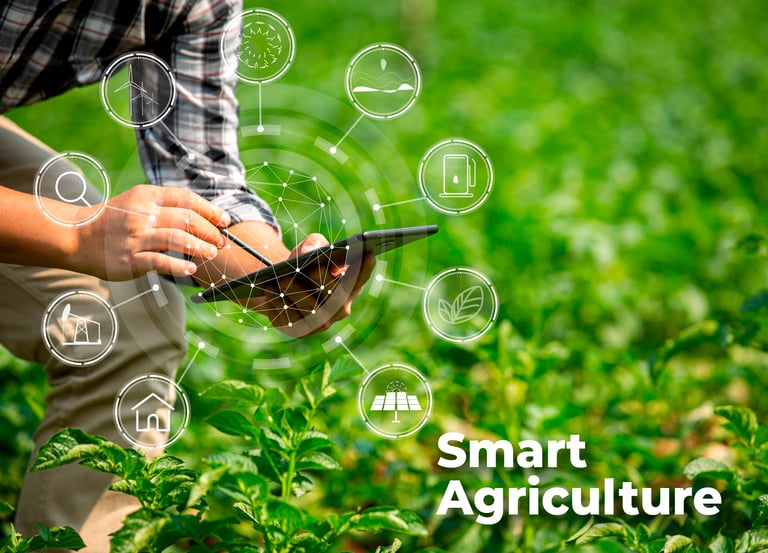 a man in a plaid shirt is holding a smart phone next to a farm