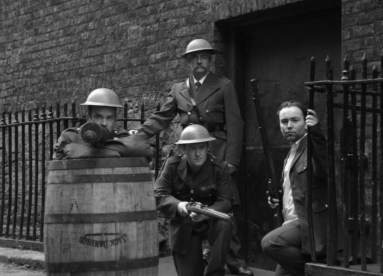 4 actors in period solider wear.