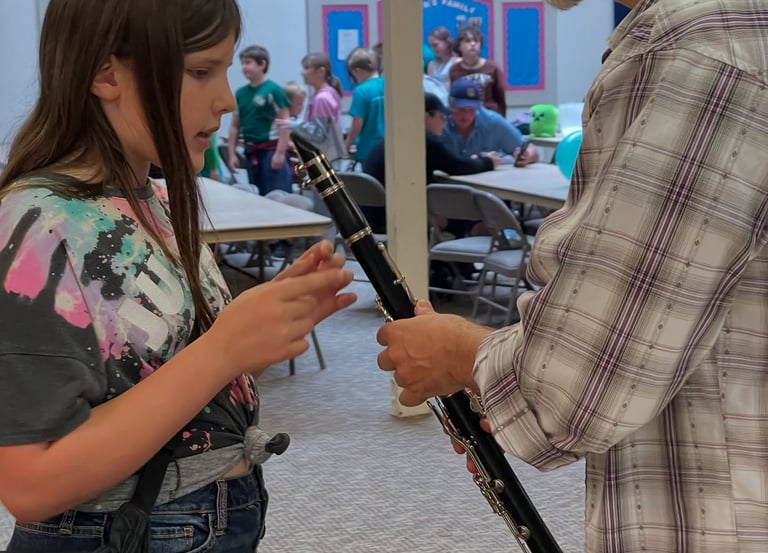 TAHB student checking out the clarinet 
