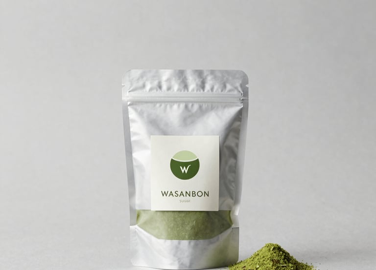 A close-up of custom-labeled matcha and wasanbon packages arranged neatly on a wooden table.
