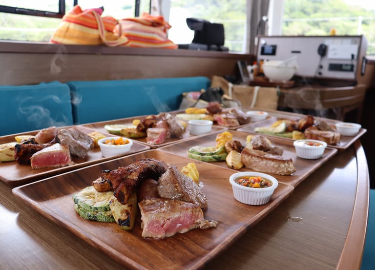 Gourmet steak lunch prepared by private chef onboard luxury catamaran tour in Costa Rica