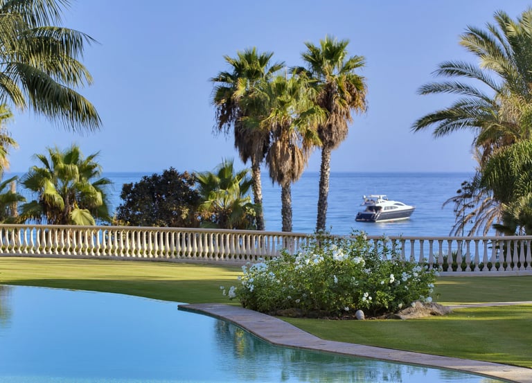 Beachfront gardens with direct views of the Mediterranean Sea