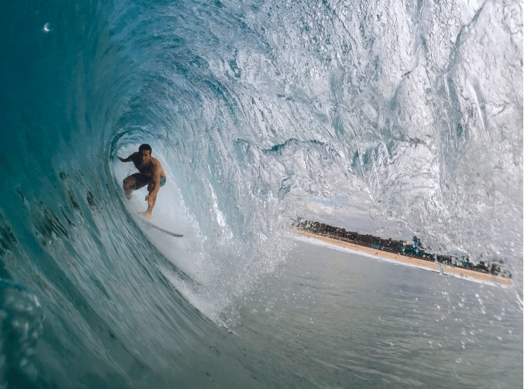 a surfer is riding a wave in the ocean