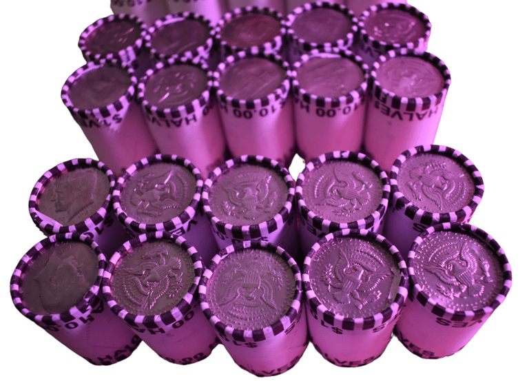 a bunch of coins sitting on top of a pile of coins