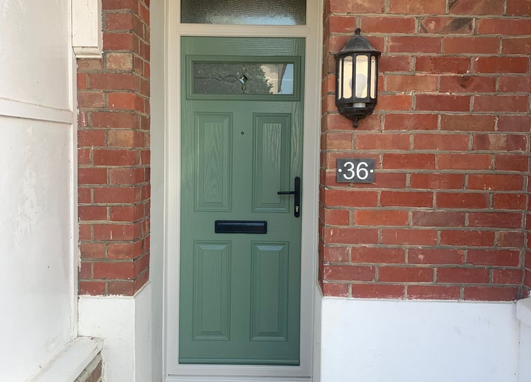 chartwell green door on red bricks and toplight with pulsar glass and antique black hardware