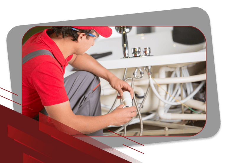 a man in a red shirt is holding a remote control system