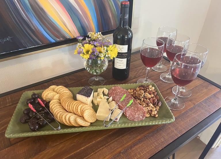 a table with wine glasses and wine glasses