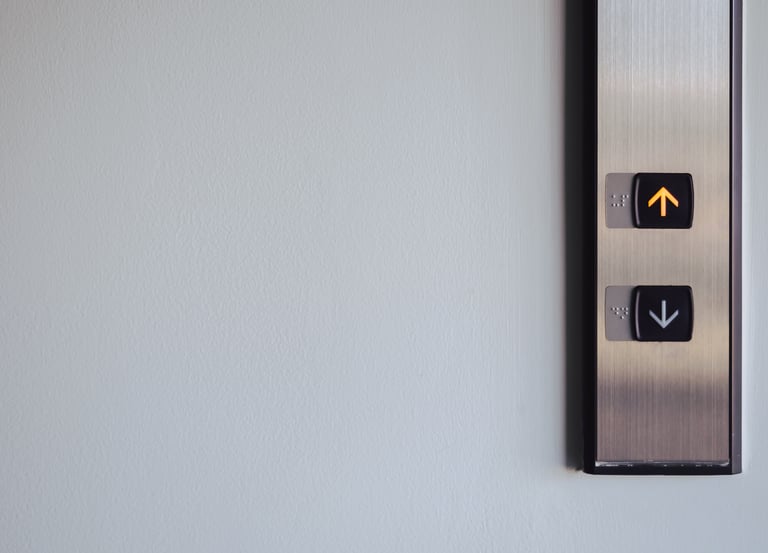 Up and down buttons in front of the Elevator