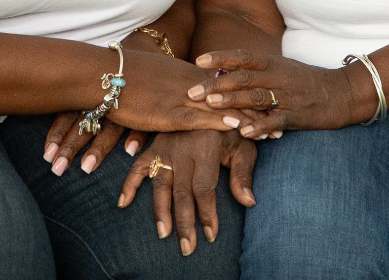 Hands of mother and daughter during a family photo session in Fort Washington, Maryland