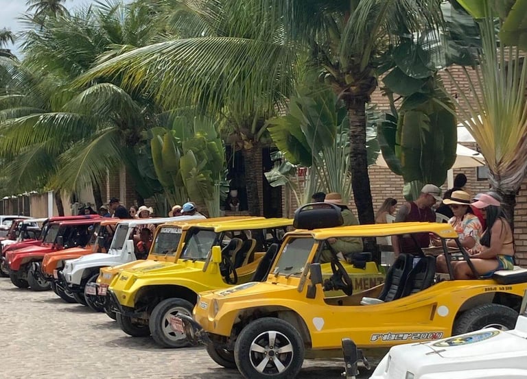 a row of jeeps parked in front of a building