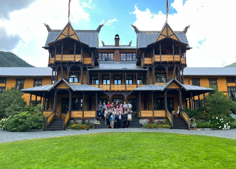 telelaget tour group in front of a  building with midieval  architechture