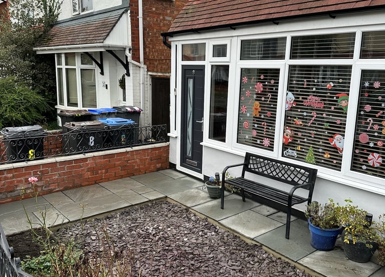 Blackpool garden paving with different size flagging