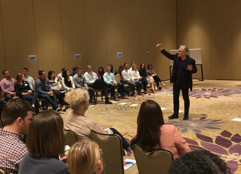 Mike Allison presenting to a group of managers from Johnson & Johnson Vision