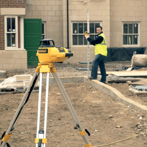 Professional laser level setup to ensure precise grading and proper water drainage on-site