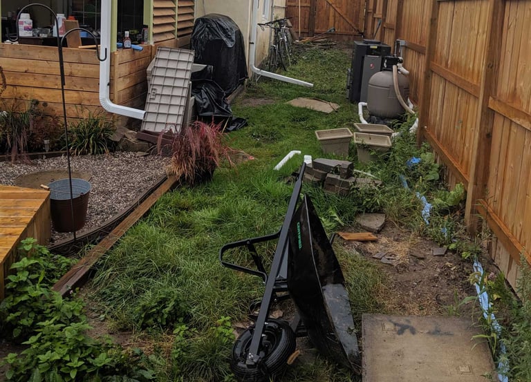 Neglected backyard before property revitalization service in Toronto by Avenue Seasons