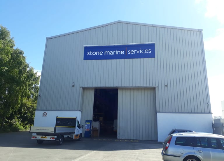 Exterior building signage installation for Stone Marine Services facility