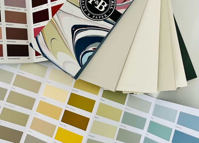 A colour sample book showing different colours and their different shades, spread on a table