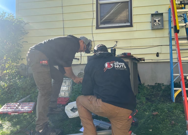The Wire Nuts electricians working on a panel upgrade in Dodge County