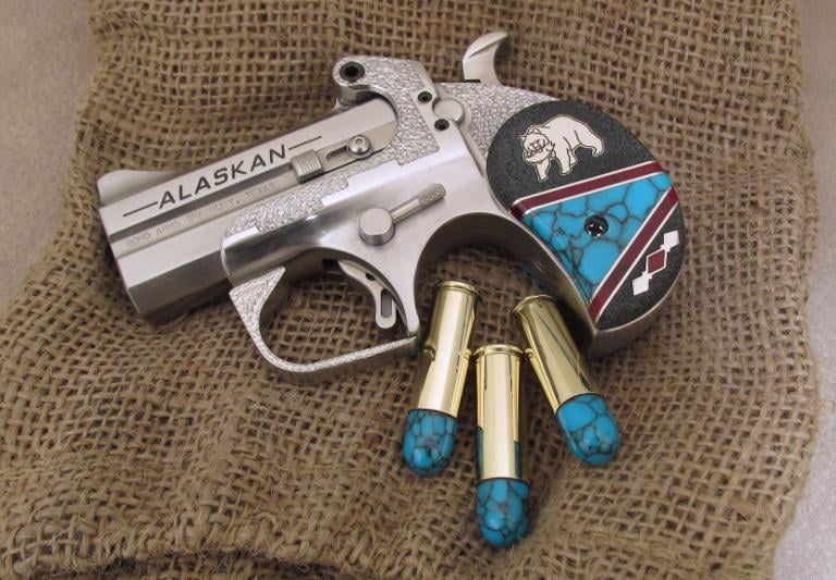 a custom made commemorative gun and bullet shells