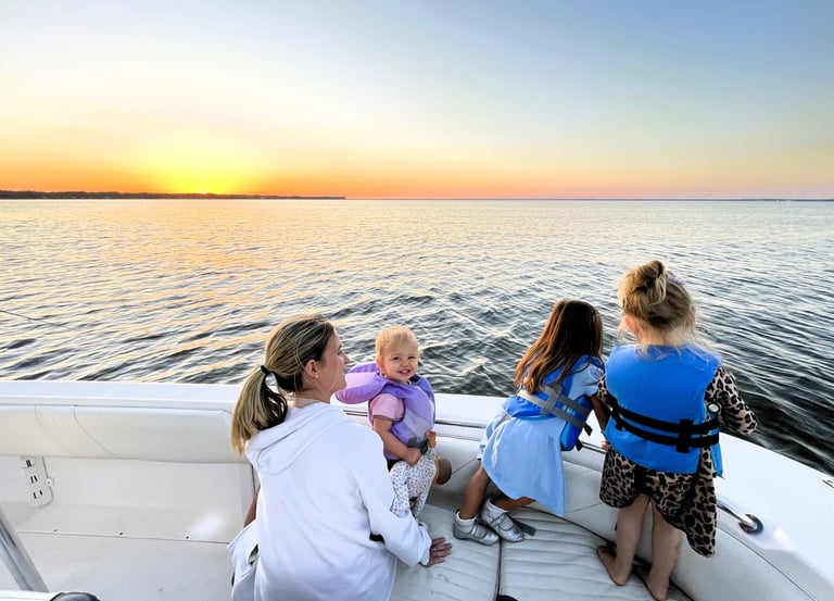 Family enjoying sunset dolphin tours in santa rosa beach.