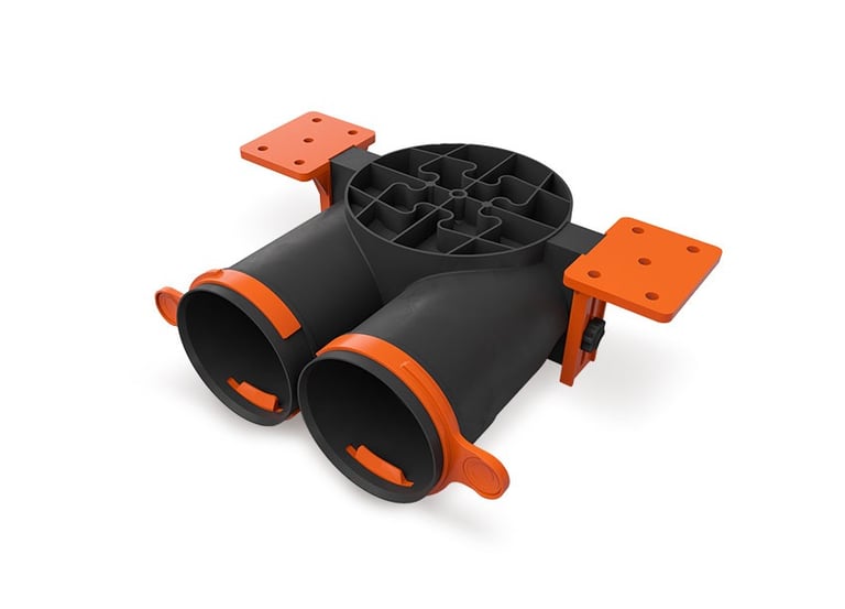 ERGOVENT AERO PRO SLIMBOX plenum distribution box with dual round duct outlets and orange mounting brackets, angled view