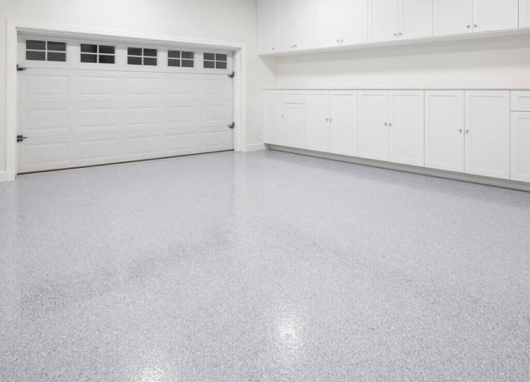 Decorative flake epoxy garage floor coating installed in a residential garage in Celina Texas