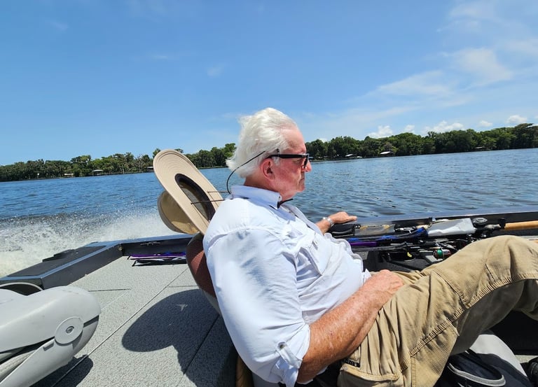 Larry sleeping in the boat