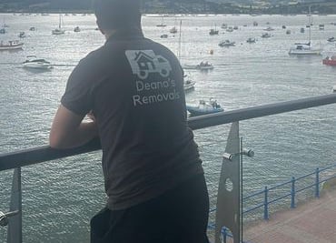 deano removals tshirt being worn by worker