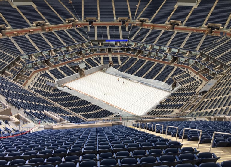 a large empty stadium with empty seats and empty seats