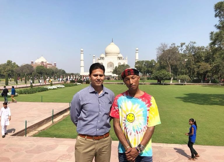 With Mr. Pharrell Williams, American singer and musician from the U.S.