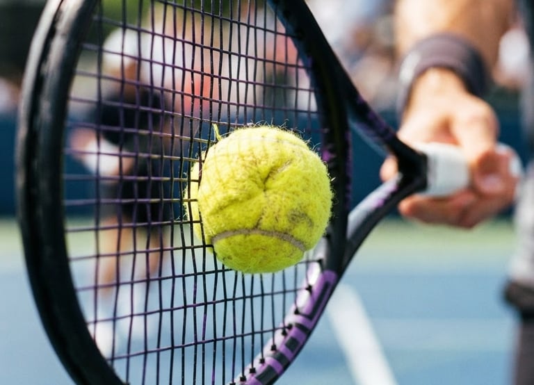 Dynamic close-up of a tennis ball compressing on racket strings, high contrast purple and yellow tones, action freeze frame, 35mm
